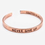 bratara din cupru never give up - front